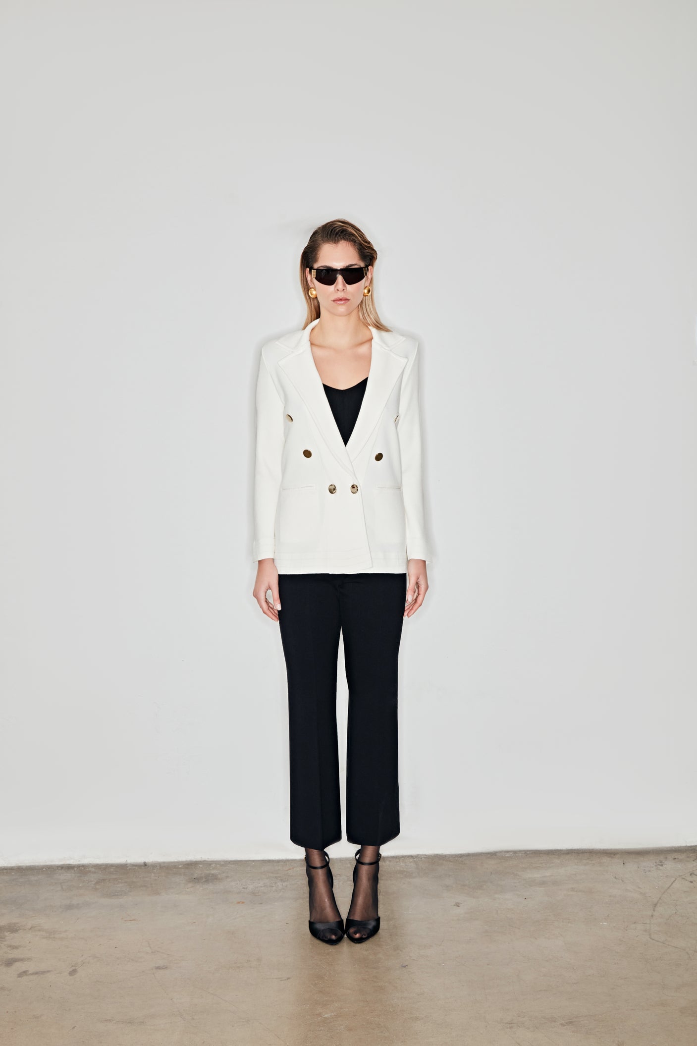 Jacket with lapels and welt pockets